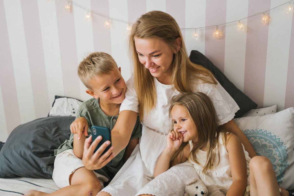 Woman invests in children by spending time with them on facetime