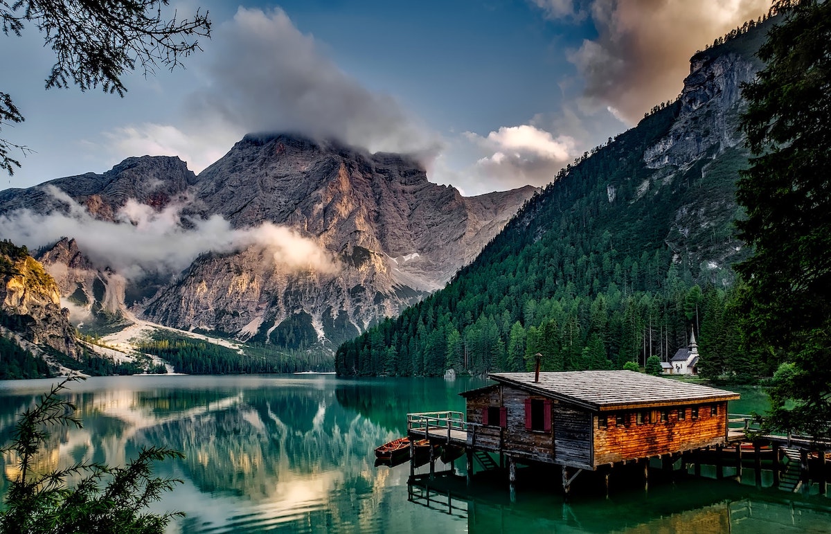 Log cabin on a lake in the mountains might face capital gains